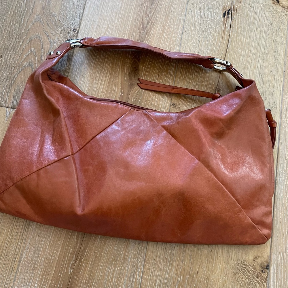 HOBO Leather Shoulder Bag. Silver Colored Hardware. Pristine on inside.